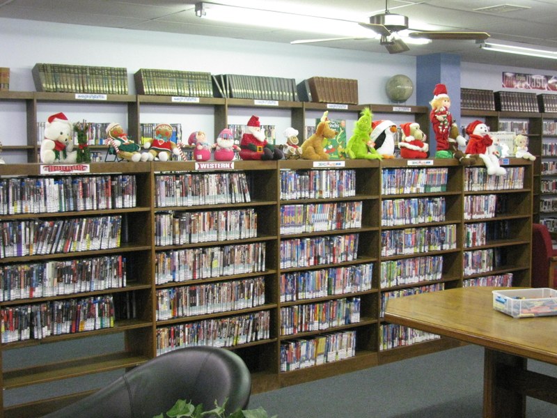 THE DECORATING OF THE LIBRARY