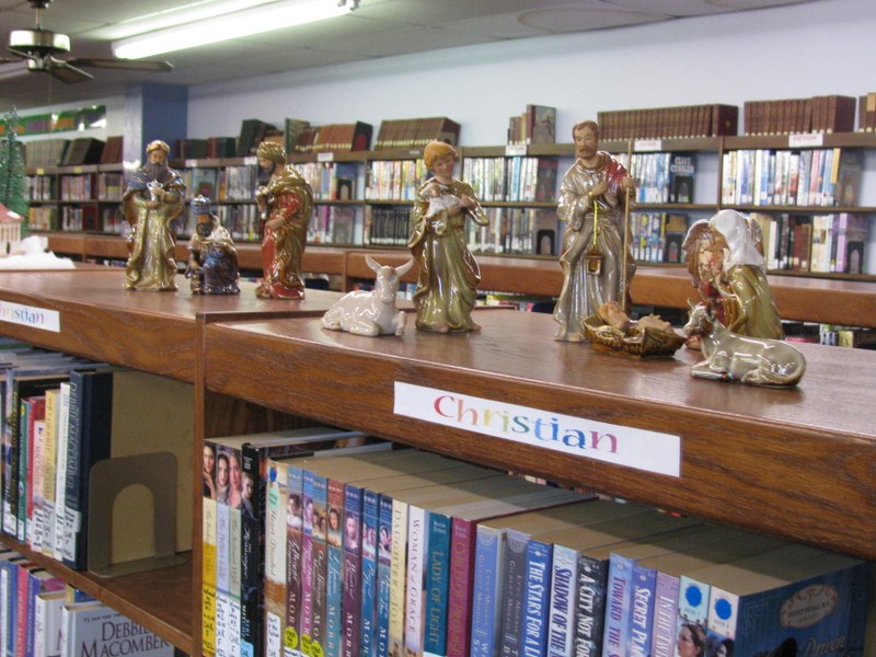 THE DECORATING OF THE LIBRARY