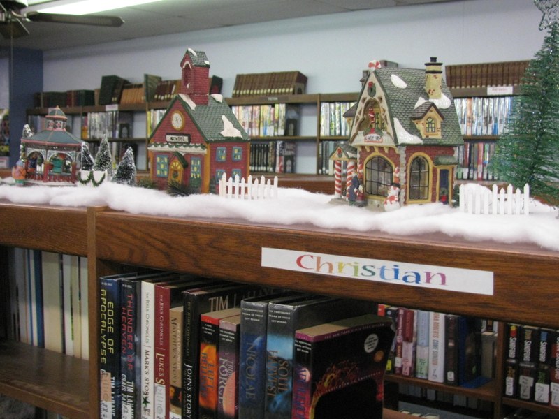 THE DECORATING OF THE LIBRARY