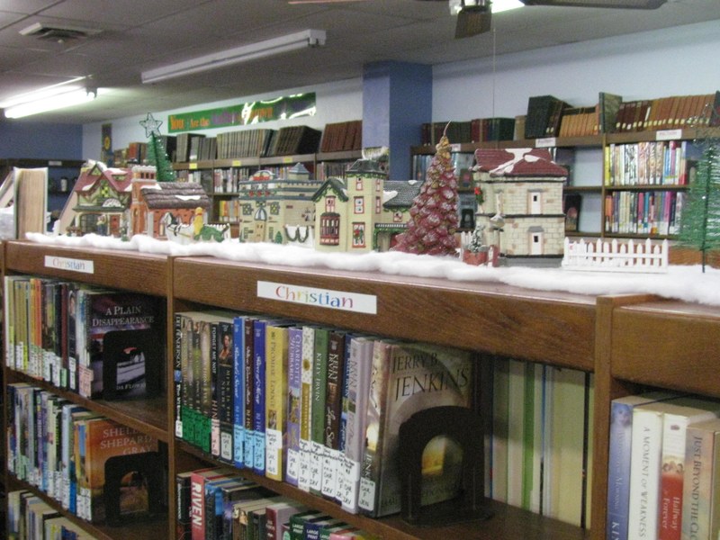 THE DECORATING OF THE LIBRARY