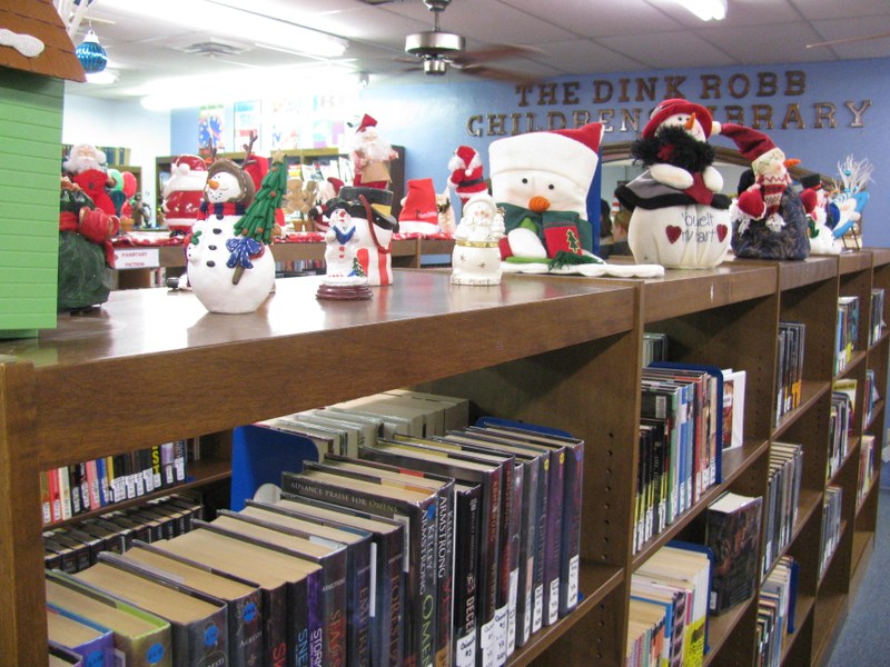 THE DECORATING OF THE LIBRARY