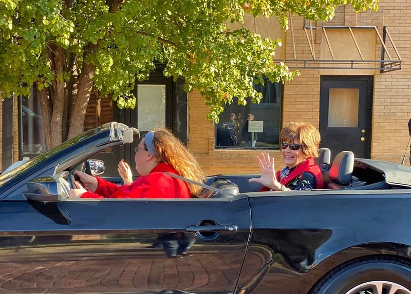 Mrs. Beisch gets full library treatment Janna drives her in the parade